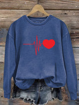 Women's Casual Heart Disease Awareness In February Wear Red Printed Long-Sleeve Sweatshirt